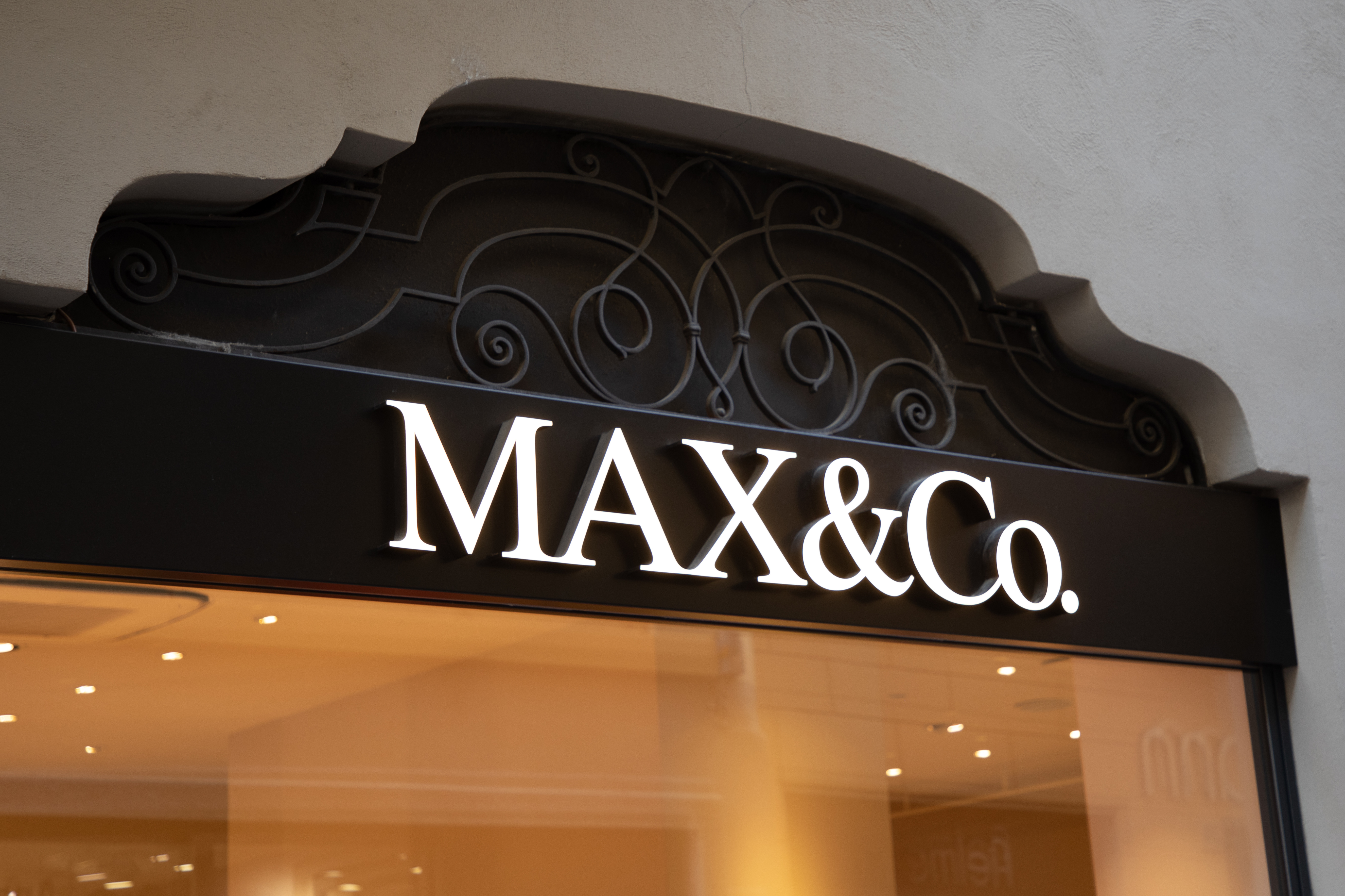 max & co paris facade wall logo brand and text sign at entrance of fashionable textile store of fashion commercial clothing chain